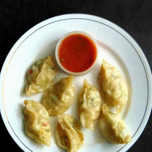 Paneer Butter Steamed Momos