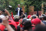 EFF leader Julius Malema addresses party supporters after visiting the family home of Anti-Apartheid Activist Winnie Madikizela Mandela in Orlando West, Soweto. 