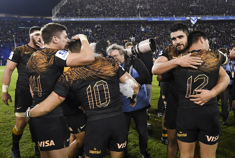 Jaguares players celebrate after winning a Super Rugby semifinal match against the Brumbies at Jose Amalfitani Stadium in June 2019 in Buenos Aires, Argentina