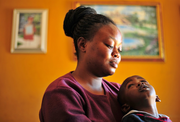 Sharon Ngwenya and her son Lizokhanya who has trouble breathing.