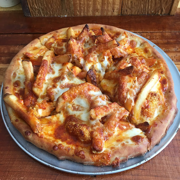 Buffalo chicken pizza with fries, “Pittsburgh Style”.