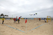 General view of a makeshift soccer field where Mozambique and Tanzania were fighting for a spot in the next round during the COSAFA Beach Soccer Tournament in Durban. 
