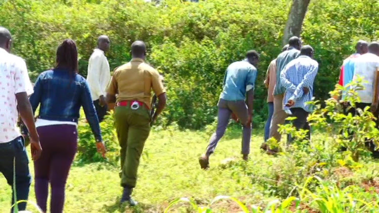 EACC officers and other government officials during a visit to the land on Friday, May 26, 2023.