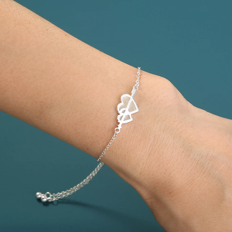 Pulseira ajustável de cobre luminosa europeia e americana com duplo coração de amor. Um presente perfeito e romântico.