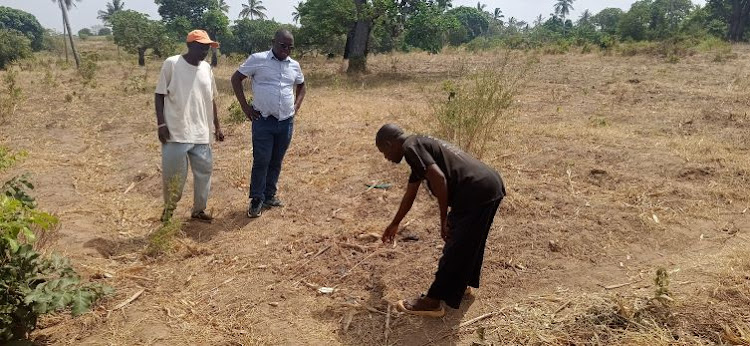Vamwani village chairman Nyae Hassan Mwajoto shows where Mohamed Nyamawi Rumba's body was found in Dzombo ward, Lunga Lunga constituency, Kwale county on February 14.