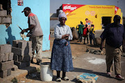 Esther Mhlanga, 82, outside a shop she rented to a foreigner in White City, Soweto. Following mob violence last week, she now plans to close the shop. 