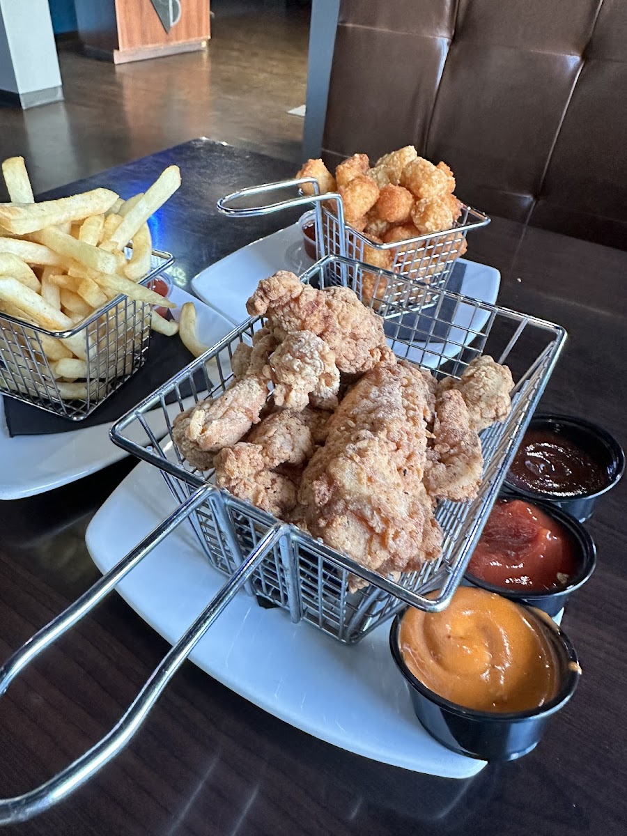 Gluten free chicken strips, tots and fries