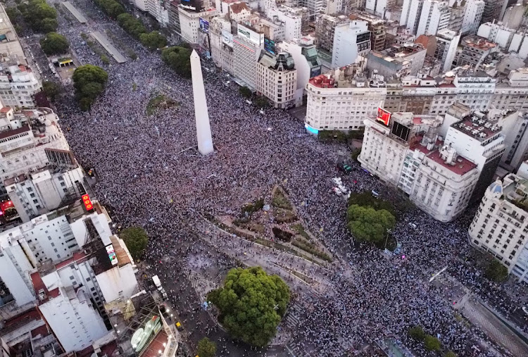 Argentina fans celebrate after the match at the Obelisk as Argentina progress to the final.