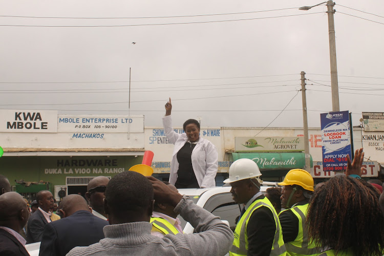 Governor Wavinya Ndeti addressing the public during her inspection tour of Machakos Bus Park renovation in Machakos County on May 29, 2023.