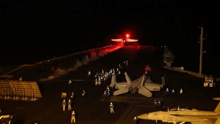 An aircraft takes off to join the US-led coalition to conduct air strikes against military targets in Yemen, aimed at the Iran-backed Houthi militia that has been targeting international shipping in the Red Sea, from an undisclosed location, in this handout picture released on January 12, 2024. Picture: US Central Command handout via REUTERS