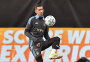 Angel Di Maria warms up during an Argentina training session at Los Angeles Memorial Coliseum in Los Angeles, California on Monday. 