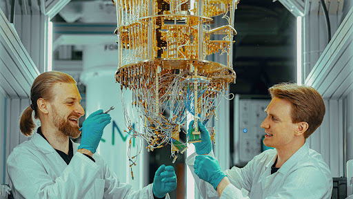 From left to right: IQM Quantum Engineer, Dr. Vladimir Milchakov IQM Delivery Engineer, Juho Hotari (Photo: Business Wire)