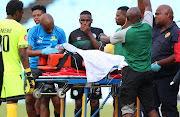 Bloemfontein Celtic defender Wandisile Letlabika is stretchered off the field after sustaining a serious head injury during a Absa Premiership 1-1 draw against Mamelodi Sundowns at Loftus on Saturday March 2 2019.   