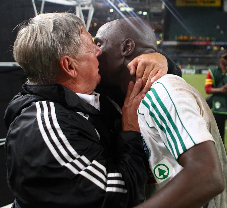 Clive Barker embraces SJ Gumede while coaching AmaZulu in a Nedbank Cup match against Mamelodi Sundown at Kings Park in Durban on May 15 2010.