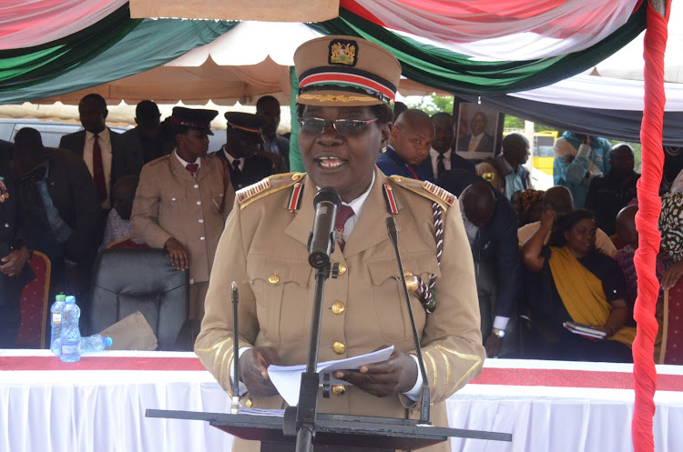 Machakos county commissioner Rhoda Onyancha reading President William Ruto's speech during the 59th Jamhuri Day celebrations at HGM Matuu Memorial Primary School in Yatta subcounty on Monday, December 12, 2022.