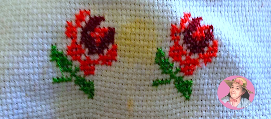 Red flowers in cross stitch 