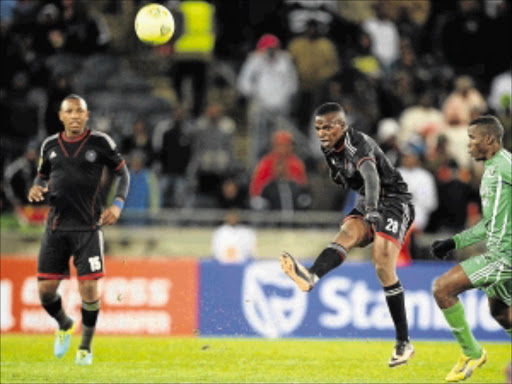 SHOOTING ON SIGHT: Orlando Pirates' Khethokwakhe Masuku gets a pass away during their Champions League match against AC Leopards at Orlando Stadium in Soweto. Photo: Gallo Images