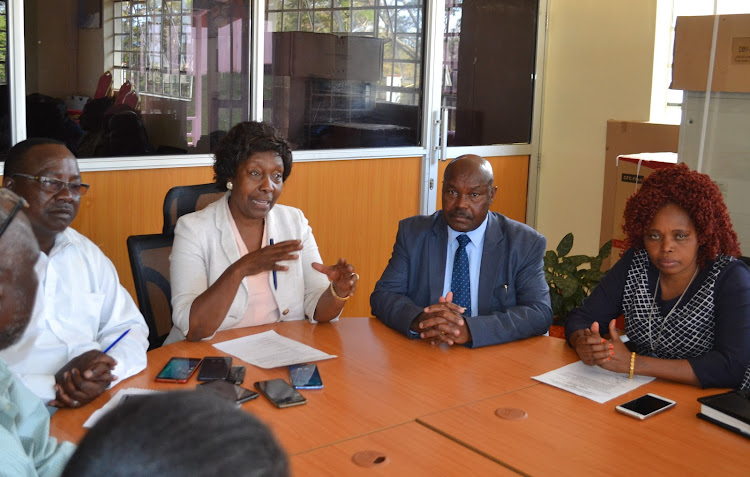 Kitui Union of Civil Servants secretary Benjamin Munyalo, Kitui Governor Charity Ngilu, Deputy Governor Wathe Nzau and tsecretary of the Kitui County Government Workers Union branch Daisy Muli at the meeting where they inked the deal.