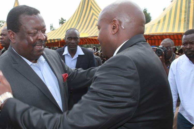 ANC party leader Musalia Mudavadi and Lugari MP Ayub Savula at the lawmaker's home in Manyonyi village in January