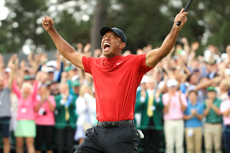 Tiger Woods of the United States celebrates after sinking his putt to win during the final round of the Masters at Augusta National Golf Club on April 14 2019. Picture: GETTY IMAGES/ANDREW REDINGTON