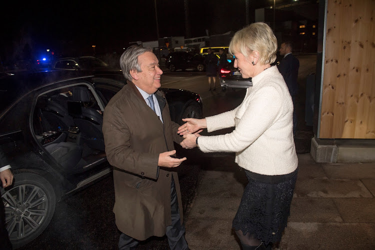 United Nations Secretary General Antonio Guterres is received by Sweden's Foreign Minister Margot Wallstrom upon arrival to Arlanda Airport, outside Stockholm, Sweden, December 12, 2018.