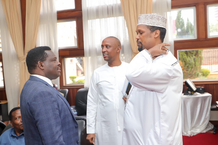 Tharaka Nithi Governor Muthomi Njuki, Abdi Guyo (Isiolo) and Senate Finance Committee chairman Ali Roba after the meeting held at Senate Chambers on Friday.