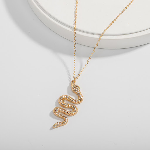 Title 6, Womens snake earring necklace. A stunning piec...