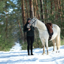 Woman and white horse