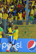 Anthony Laffor celebrates his goal with Hlompho Kekana during the CAF Champions League Semi Final - 2nd Leg match between Mamelodi Sundowns and Zesco United at Lucas Moripe Stadium on September 24, 2016 in Pretoria, South Africa.