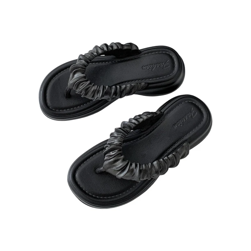 Couple's plywood flip-flops for beach and seaside. Cool and comfortable footwear, perfect for enjoying the coast and sea