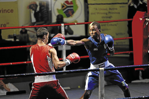 Ayabonga Sonjica, right, guns for the South African junior featherweight title when he faces Innocent Mantengu. / MARK ANDREWS