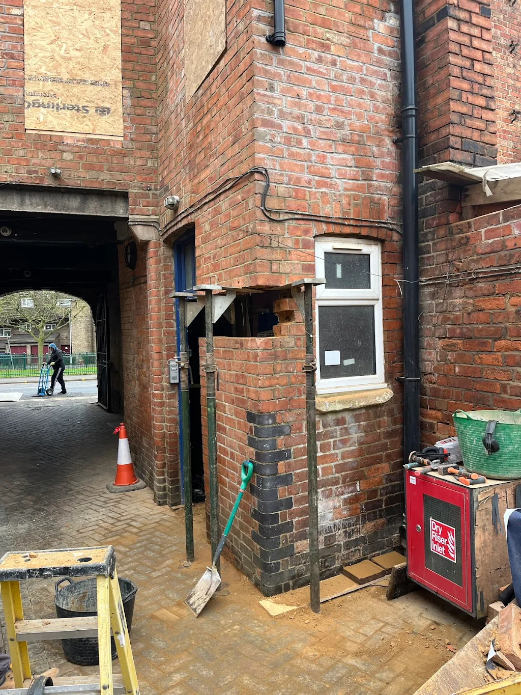 Slot cut into masonry ready for steel support beam
