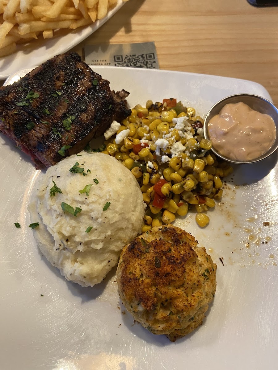 my partner got the steak and i got crabcake, this is kind of a shared plate- but it was delicious.