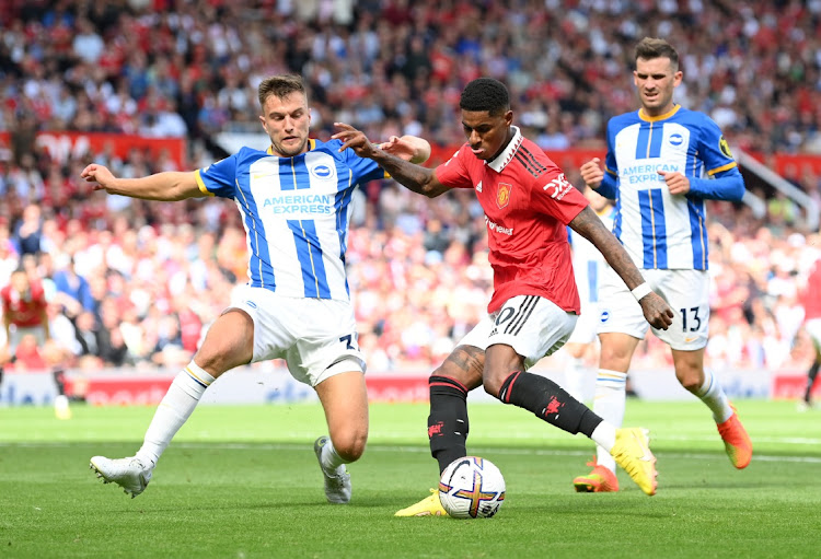 Marcus Rashford of Manchester United is put under pressure by Joel Veltman of Brighton & Hove Albion during the Premier League match at Old Trafford on August 07.