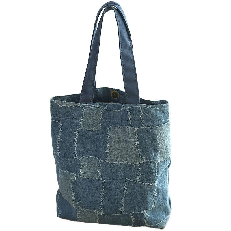 Draagbare stoffen handtas voor werk en uitgaan. Stijlvolle en praktische tas voor onderweg, ideaal om alles wat je nodig hebt comfortabel mee te nemen.
