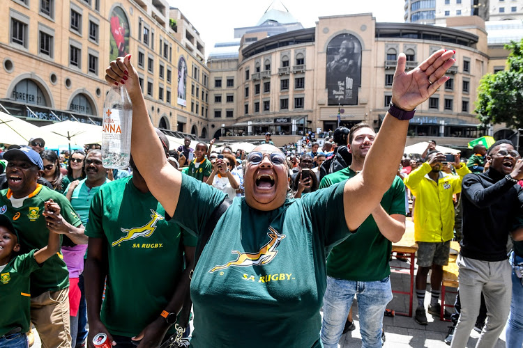 Supporters watch the Rugby World Cup 2019 final at Nelson Mandela Square in Johannesburg.