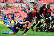 Rudi van Rooyen of the Kings is tackled by Luke McGrath of Leinster during the 2017 Guinness PRO14 game between the Southern Kings and Leinster at Nelson Mandela Bay Stadium on 16 September 2017. 