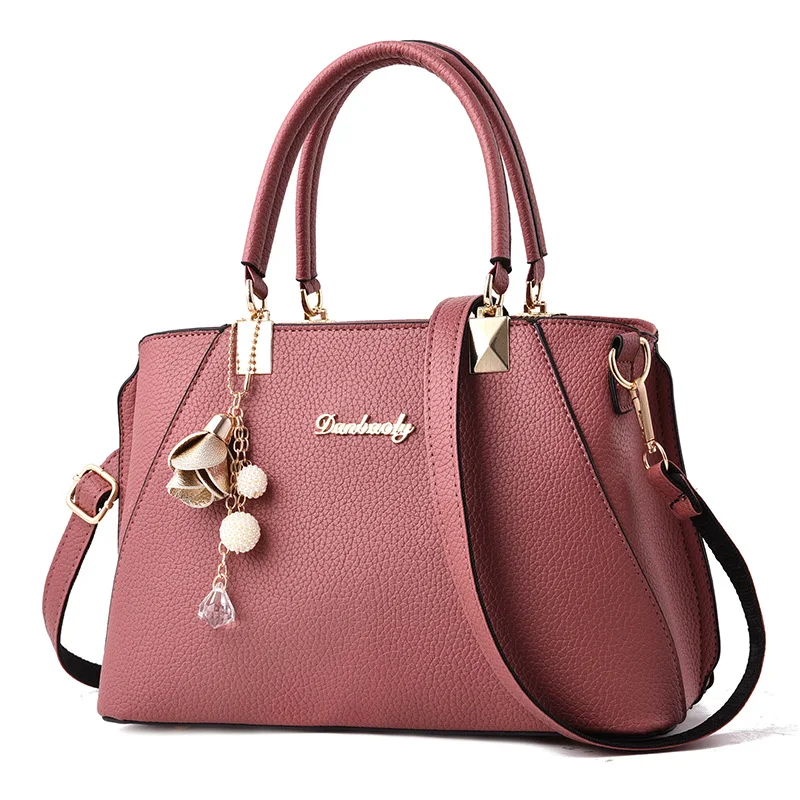 Nouveau sac à main femme à épaule unique motif litchi. Un accessoire tendance et élégant, parfait pour compléter votre look avec style et ajouter une touche de sophistication.