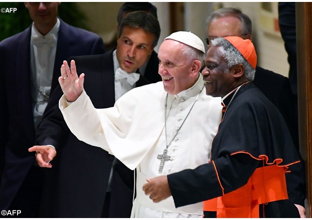 Pope Francis with Cardinal Peter Turkson, President of the Pontifical Council for Justice and Peace - AFP