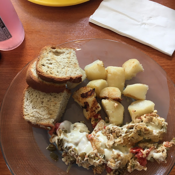 Theresa's egg with gf Udis bread and potatoes made in a separate pan