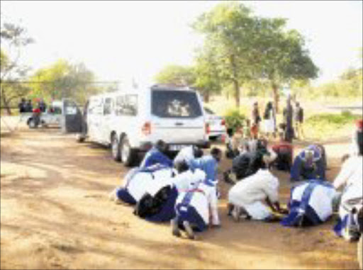 FLASHBACK: The first time, the family failed to bury Senios Mokoena after they found the farm gate leading to the graveside locked. 04/05/08. © Sowetan.