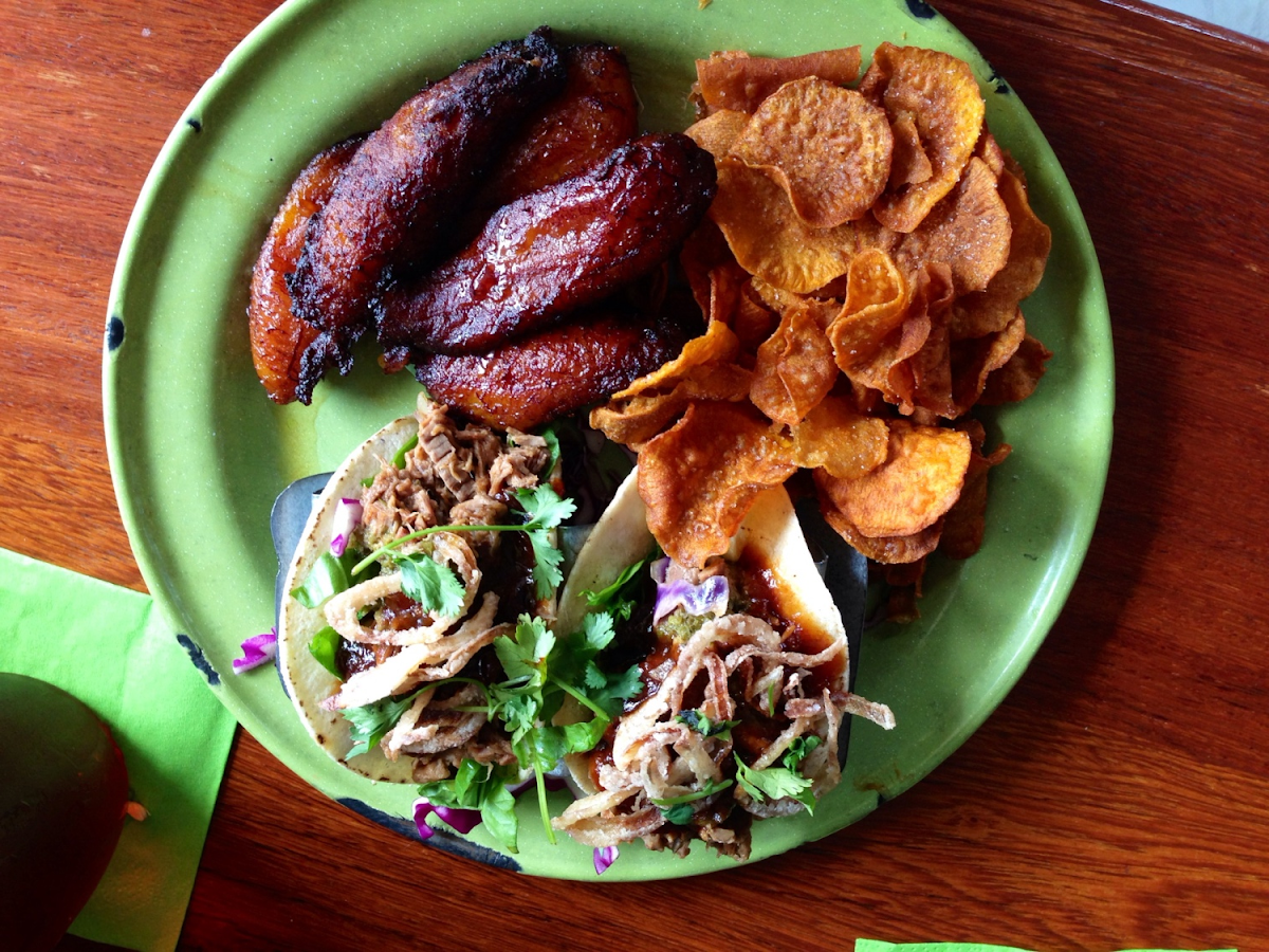 Yum-O! Brisket tacos, sweet potato chips, and fried plaintains.