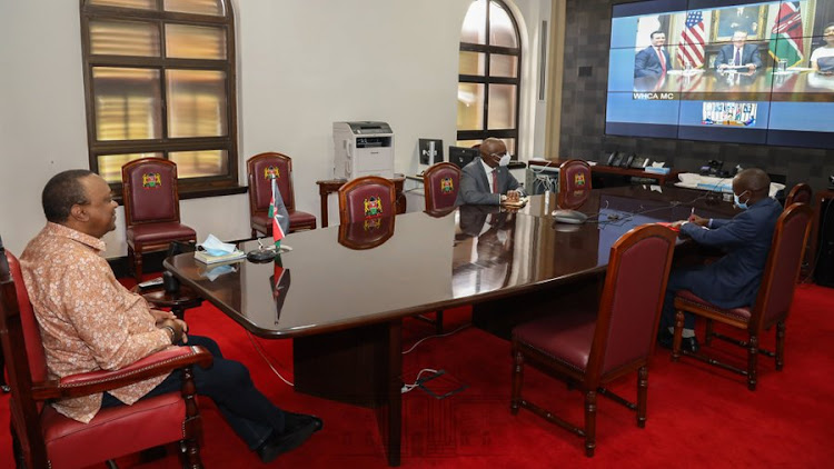 President Uhuru Kenyatta and government officials during a virtual meeting on the Kenya-US Free Trade Agreement (FTA) negotiations.