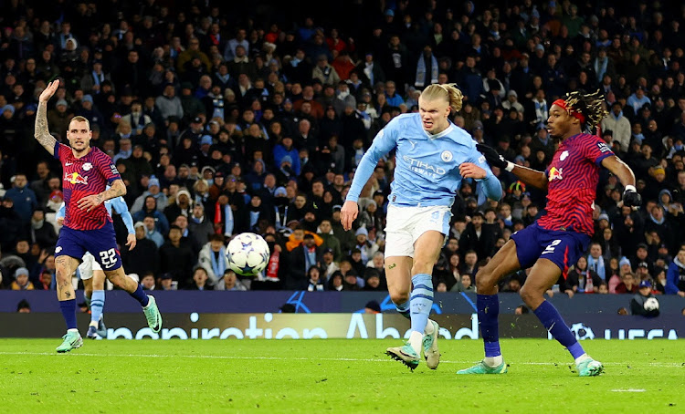 Manchester City's Erling Haaland scores their first goal in their Uefa Champions League Group G match against RB Leipzig at Etihad Stadium in Manchester on Tuesday night.