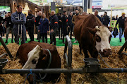 Members of the French police stand guard inside the Porte de Versailles exhibition centre on the day of French President Emmanuel Macron's visit to the International Agriculture Fair (Salon International de l'Agriculture) during its inauguration in Paris, France, February 24, 2024. 