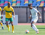 Harris Tchilimbou of Bloemfontein Celtic and Divine Lunga of Golden Arrows