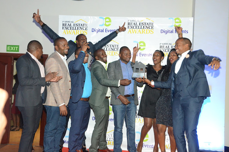 Mahiga Homes LTD celebrates after winning two awards, best in off plan residential sales and best low cost low rise residential developer.