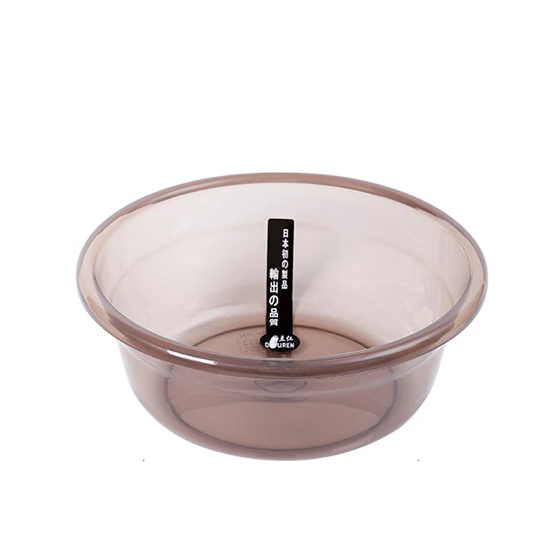 Bac à laver transparent en plastique pour la maison, idéal pour la lessive. Robuste et polyvalent, facilite le nettoyage.