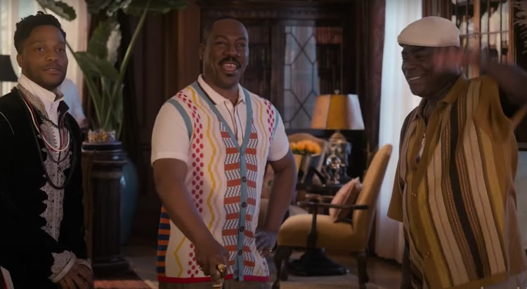 Actor Eddie Murphy can be seen wearing one of MaXhosa Africa's signature knits in this screen grab from the trailer for 'Coming to America 2'.