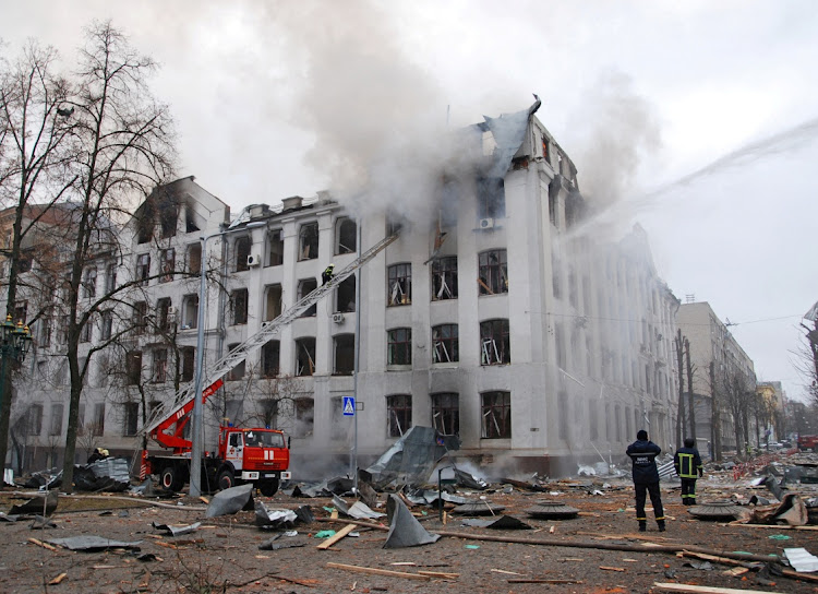 Firefighters work to extinguish a fire at the Kharkiv National University building which city officials said was damaged by shelling in Kharkiv, Ukraine, on March 2.